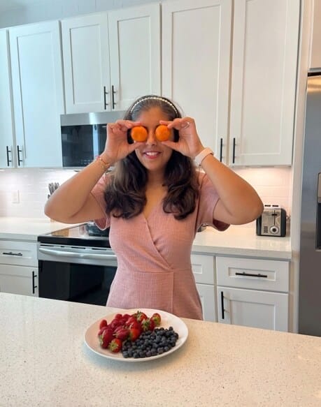 Monica with Fruits